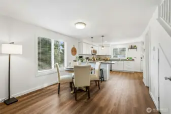 Open sightlines to the living room and kitchen make the space feel connected and spacious.