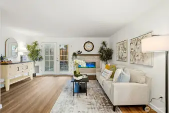 French doors bring in natural light, making the whole home feel warm and inviting.