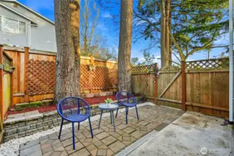 Fully fenced paver patio creates your own private outdoor retreat.