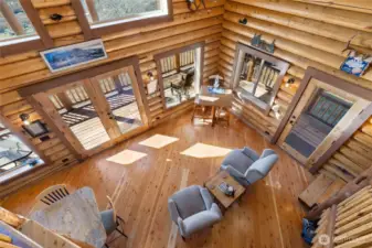 A view from the loft looking down on to the main floor living area.