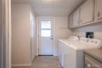 Laundry room and door to carport
