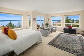 This image of the primary suite says it all! Huge room. Huge views.