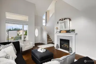 Looking back to the front door, stairs lead to upstairs bedrooms and convenient laundry room. Let's go take a look!