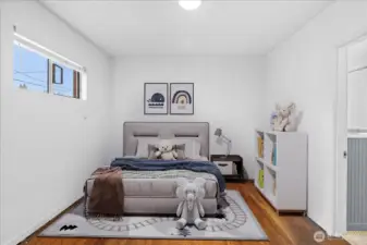 *Virtual Staged-1st bedroom off living room.