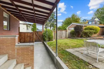 Access off kitchen and downstairs to yard and garage.