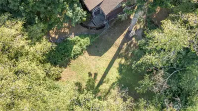 Even with the trees surrounding the property and giving it a private feel, the yard still gets generous sunshine throughout the day. It’s an ideal mix of shade and light, perfect for summer gatherings, stretching out in the sun, or tending to a garden as the seasons change.