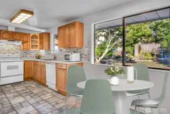 Large kitchen looks out onto the backyard.