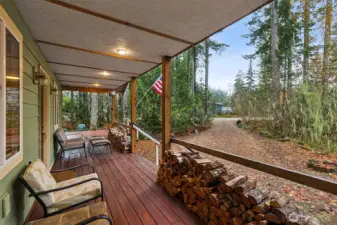 How can you not love this front porch?! And you set up for wood this winter. I love the long drive adding so much privacy.