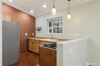 Kitchen view three, note the detail in the ceiling.