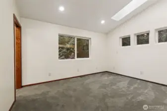 Back bedroom with ensuite bath, love the skylight and all the windows!
