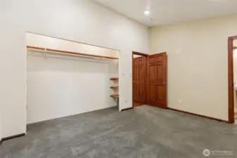 Back bedroom's HUGE closet, ensuite bath to your right.
