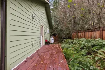 View of the back of property, back entrance and the deck that will not stop lol!
