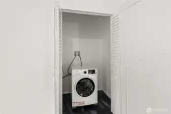 primary bedroom laundry room