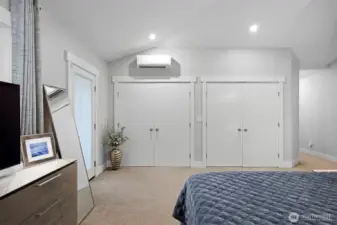 Primary bedroom with 4 closets (two not pictured).