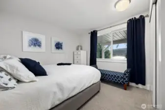 Lower level bedroom with lake views.