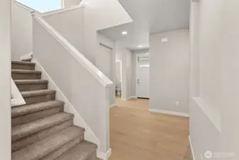 Dramatic entryway with vaulted ceilings and art niches on walls definitely make a statement!