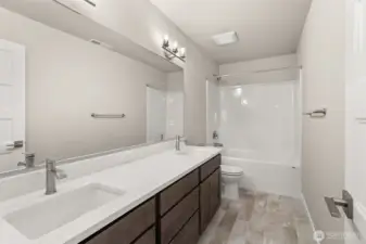 Second floor hall bath with a dual vanity