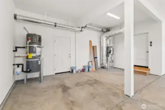 High efficiency Carrier electric forced-air furnace and Electric hybrid water heater.