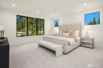 Designer primary suite with five-piece bath with heated floors