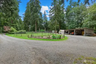 One of the many garden areas and equipment / tool storage