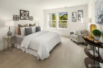 Bright and spacious primary bedroom with wall space for art, bookshelves and additional furniture!
