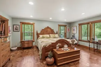 PRIMARY BEDROOM is located on the main floor, with an ensuite bathroom , walk in closet AND another closet too! So much space.. overlooking Germany Creek.. Doesn't get any better than this!