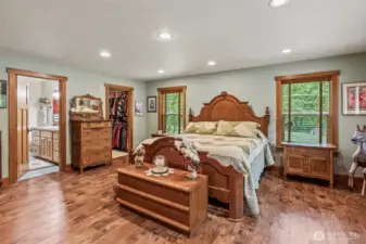 Primary Bedroom with engineered hardwood floors.