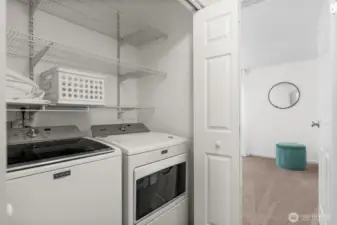 The laundry is conveniently located upstairs, and the washer and dryer are included with the home.