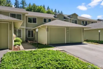 This turn-key condo offers a one-car garage plus driveway parking for an additional vehicle, along with ample guest parking within the complex for added convenience.