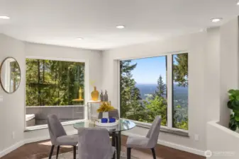 Another dining space sits off of the kitchen and has access to a large deck.