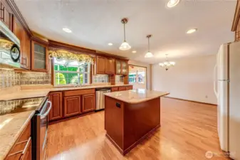 Extremely functional kitchen layout with extra seating space available at island.