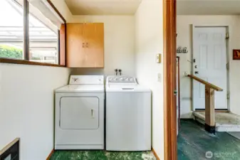 Bright and cheery laundry room.