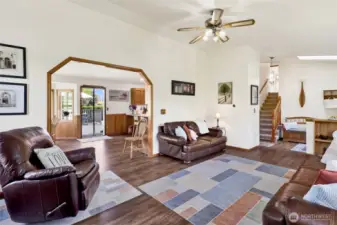 Vaulted Ceilings are topped with a ceiling fan.