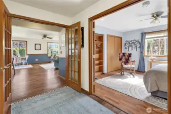 French doors access the spacious 5th bedroom as well as the enormous lower level living space.