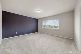 Upstairs primary suite with 5-piece bath and large walk-in closet.