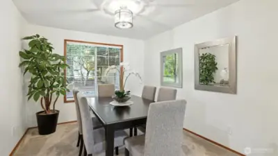 Well-sized dining room with views into the private backyard
