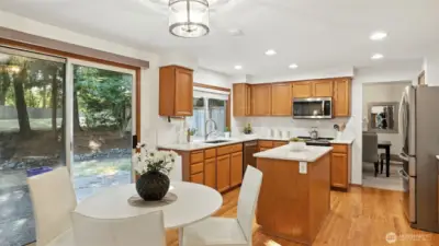 Sunny eating nook with slider to generous backyard