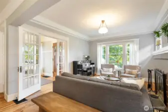 The living room enjoys nice natural light through the large west facing front window.