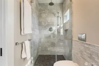 The walk-in shower in the primary bath.