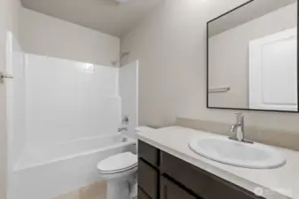 Photographs are for illustrative purposes only. Features, finishes, interior/exterior colors, landscaping and floorplan shown may vary from actual homes built.