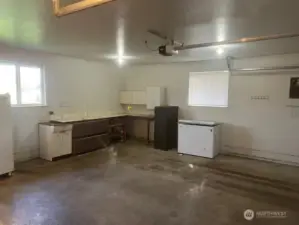 2 car garage with workspace.