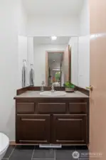 There is also a convenient half-bath on main level.