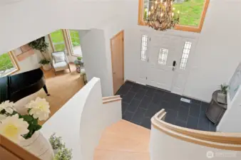 The grand staircase overlooks the entry and takes you to the second floor.