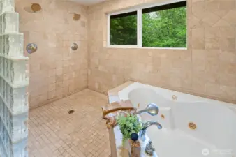 Enjoy dual shower heads overlooking the trees, or soak in the stars as you relax in your bath.