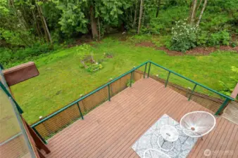 Looking down from the deck, you see how amazing this property is ~ add a fire pit or veggie beds!