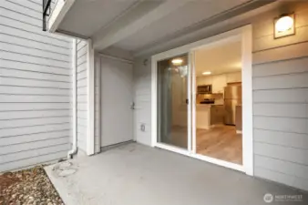 You'll love the covered patio for BBQs and enjoying the outdoors.End-unit and shubery make it private.