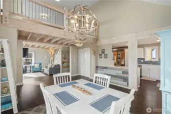 View to upstairs loft area from dining area