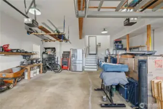 2 car oversized garage with tons of storage & built-in work bench