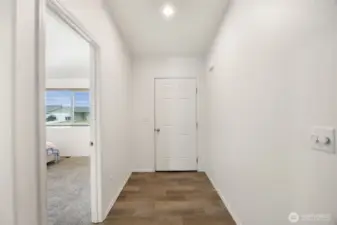 Inside the front door entry.