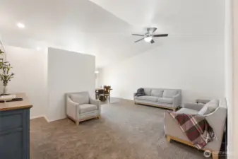 Large living room with vaulted ceilings.